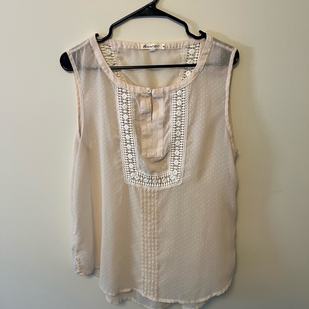 Sheer cream sleeveless top